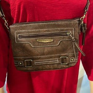 Stone Mountain brown leather cross body handbag.